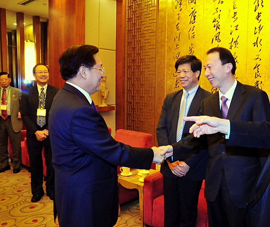 参访团访鄂王国生杨松会见