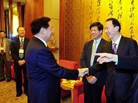 参访团访鄂王国生杨松会见